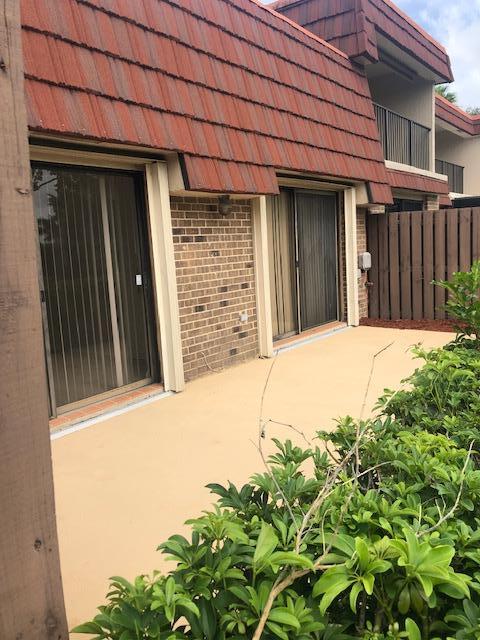 8294 Boca Rio Drive Boca Raton, FL 33433 - Photo 14 of 18 a view of a backyard of the house