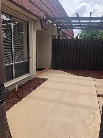 a view of backyard with hardwood