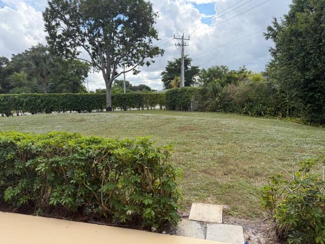 8294 Boca Rio Drive Boca Raton, FL 33433 - Photo 18 of 18 a view of a yard with an outdoor space