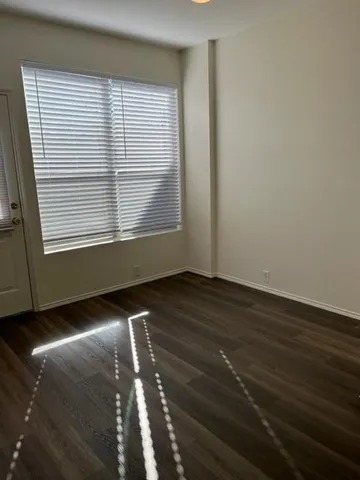 a bathroom with a toilet a sink and bathtub