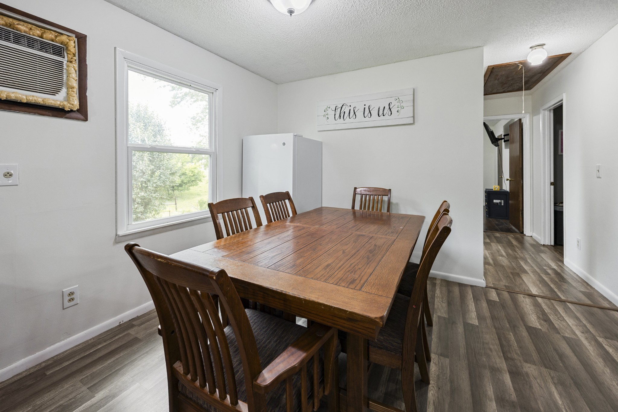421 Shady Grove Road Flintville, TN 37335 - Photo 15 of 33 a view of a dining room with furniture and wooden floor