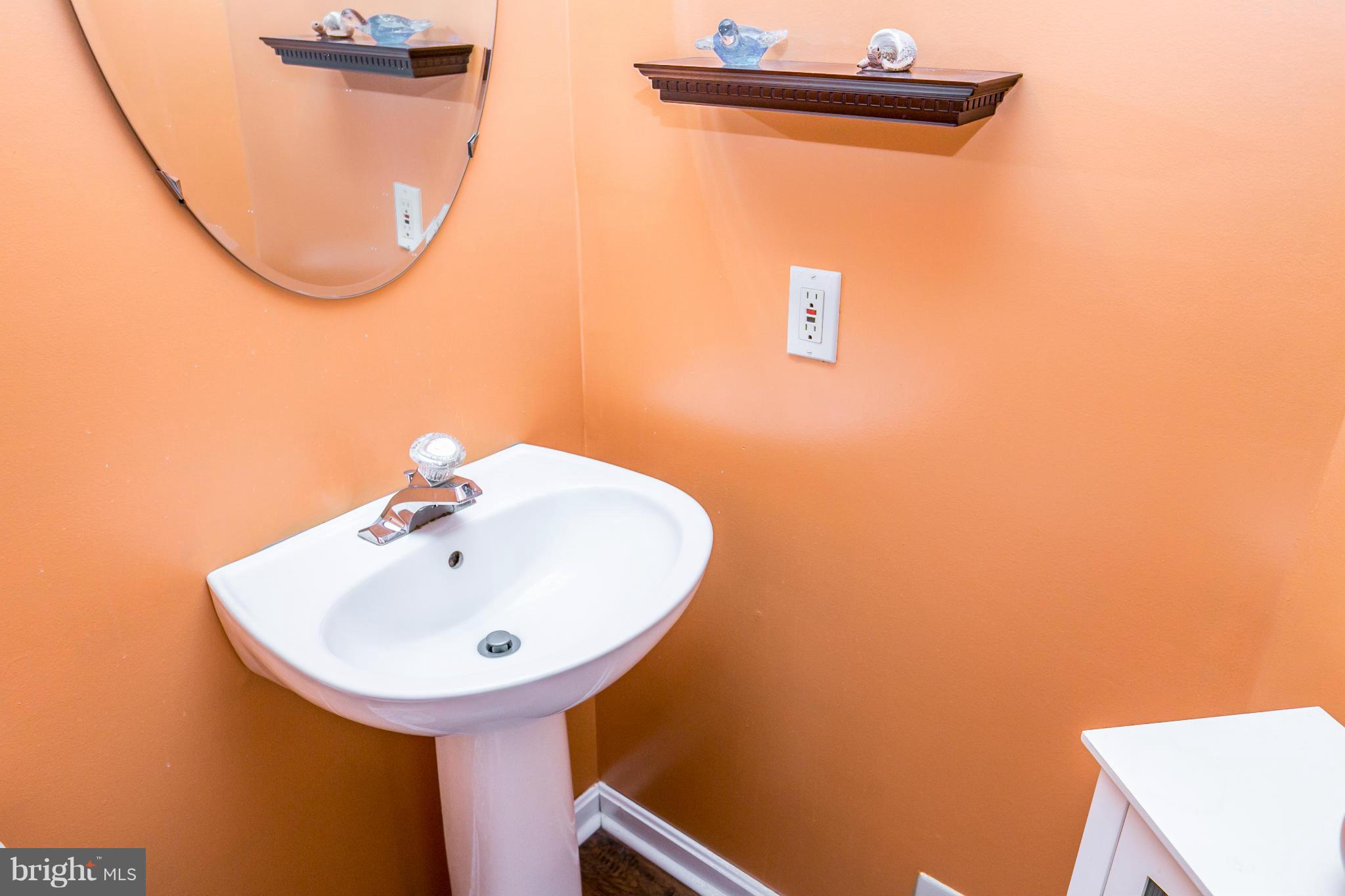 9811 Finsbury Road Baltimore, MD 21237 - Photo 11 of 30 Main Level Half Bath