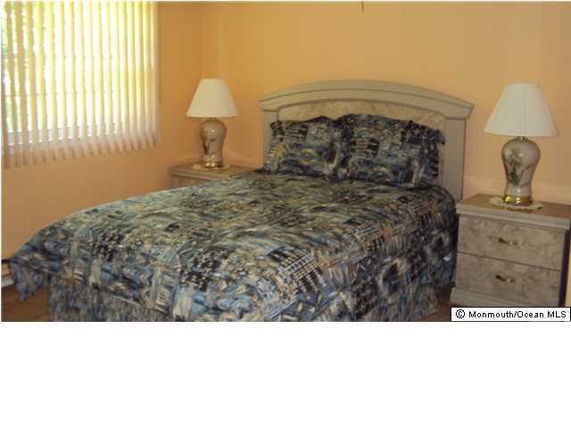 3A Spring Street, Unit B Whiting, NJ 08759 - Photo 13 of 17 a black and white photo of a bedroom