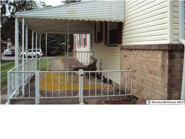 3A Spring Street, Unit B Whiting, NJ 08759 - Photo 4 of 17 a view of a balcony with door