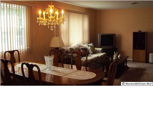 3A Spring Street, Unit B Whiting, NJ 08759 - Photo 6 of 17 a living room with furniture and a flat screen tv
