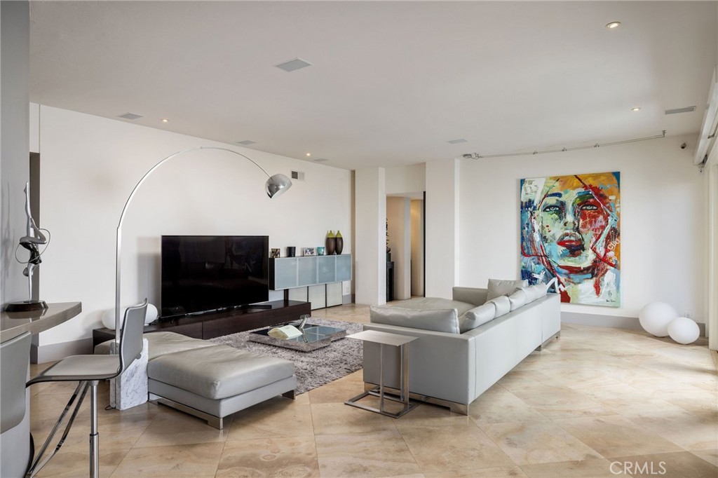 5 Old Ranch Road Laguna Niguel, CA 92677 - Photo 13 of 24 a living room with furniture and a flat screen tv