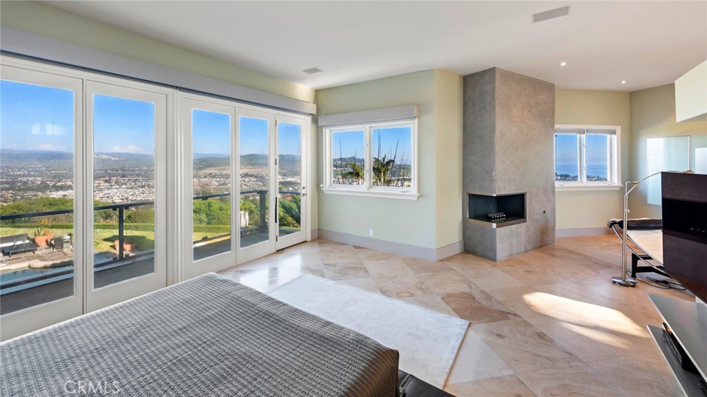 5 Old Ranch Road Laguna Niguel, CA 92677 - Photo 17 of 24 a view of a bedroom with workspace and a window