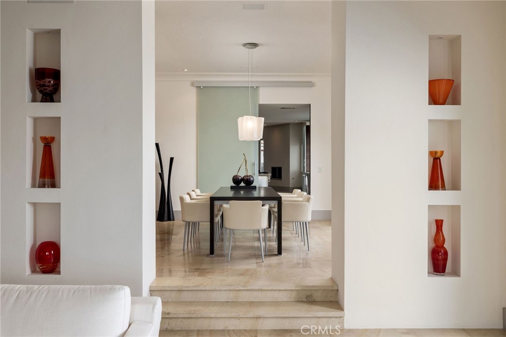 5 Old Ranch Road Laguna Niguel, CA 92677 - Photo 8 of 24 a dining room with a table and chairs