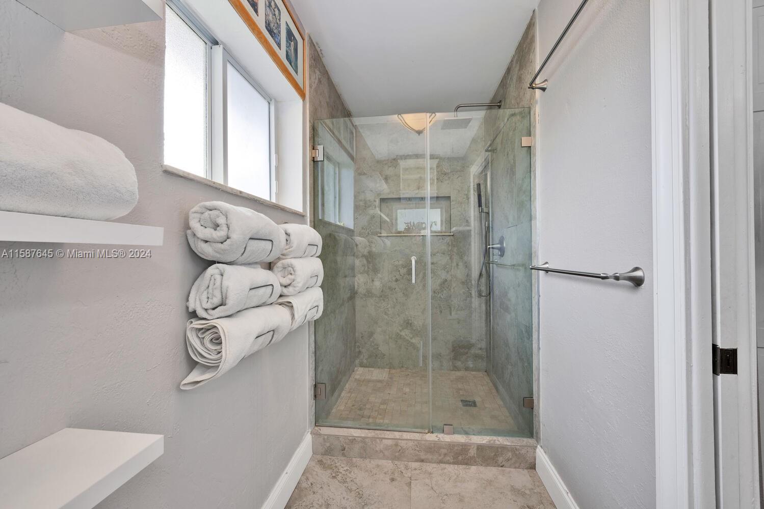 18565 Southwest 295th Terrace Homestead, FL 33030 - Photo 28 of 42 a bathroom with a shower