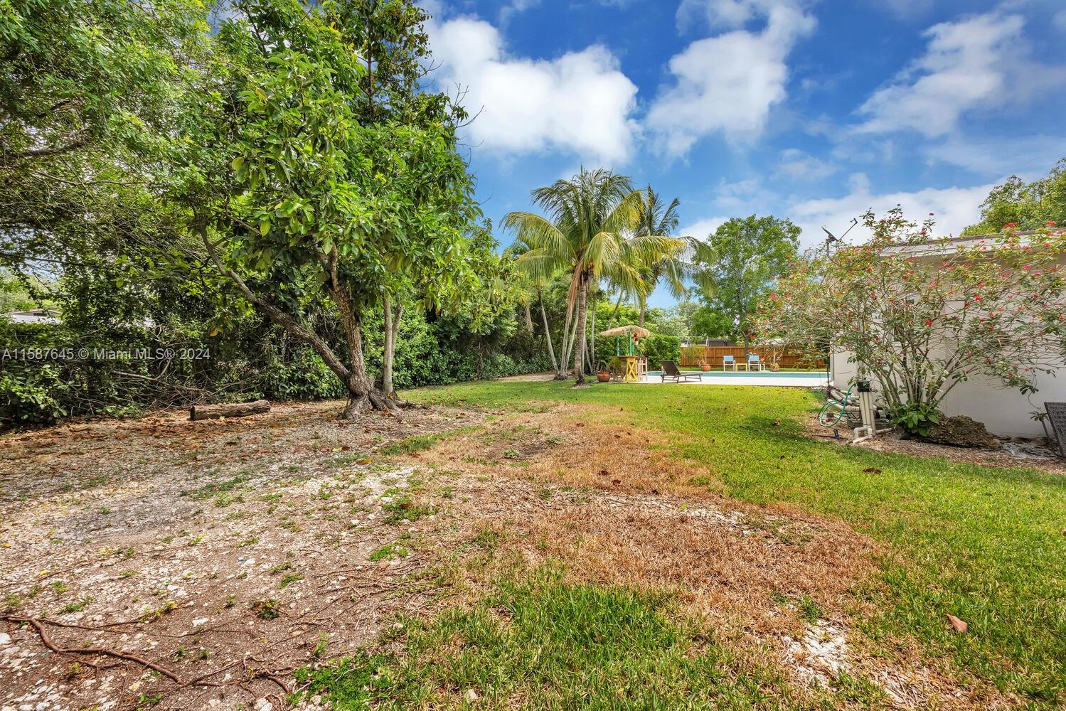 18565 Southwest 295th Terrace Homestead, FL 33030 - Photo 38 of 42 a view of a trees with a yard