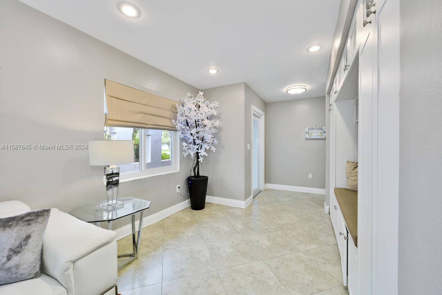 18565 Southwest 295th Terrace Homestead, FL 33030 - Photo 10 of 42 a bathroom with a sink and a mirror