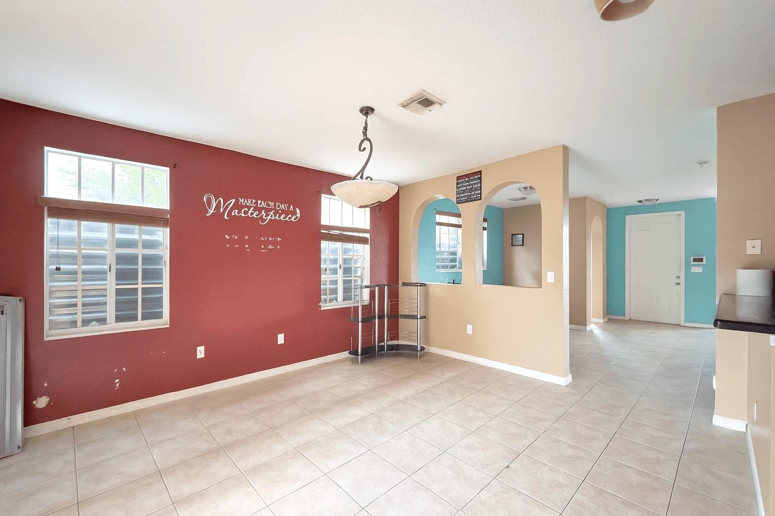 14218 Southwest 272nd Street, Unit 1 Homestead, FL 33032 - Photo 8 of 24 a view of livingroom with furniture window and wooden floor