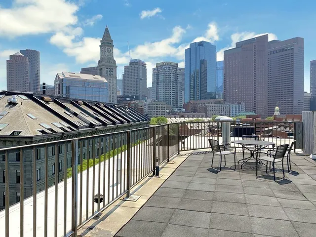 a view of a terrace with chairs