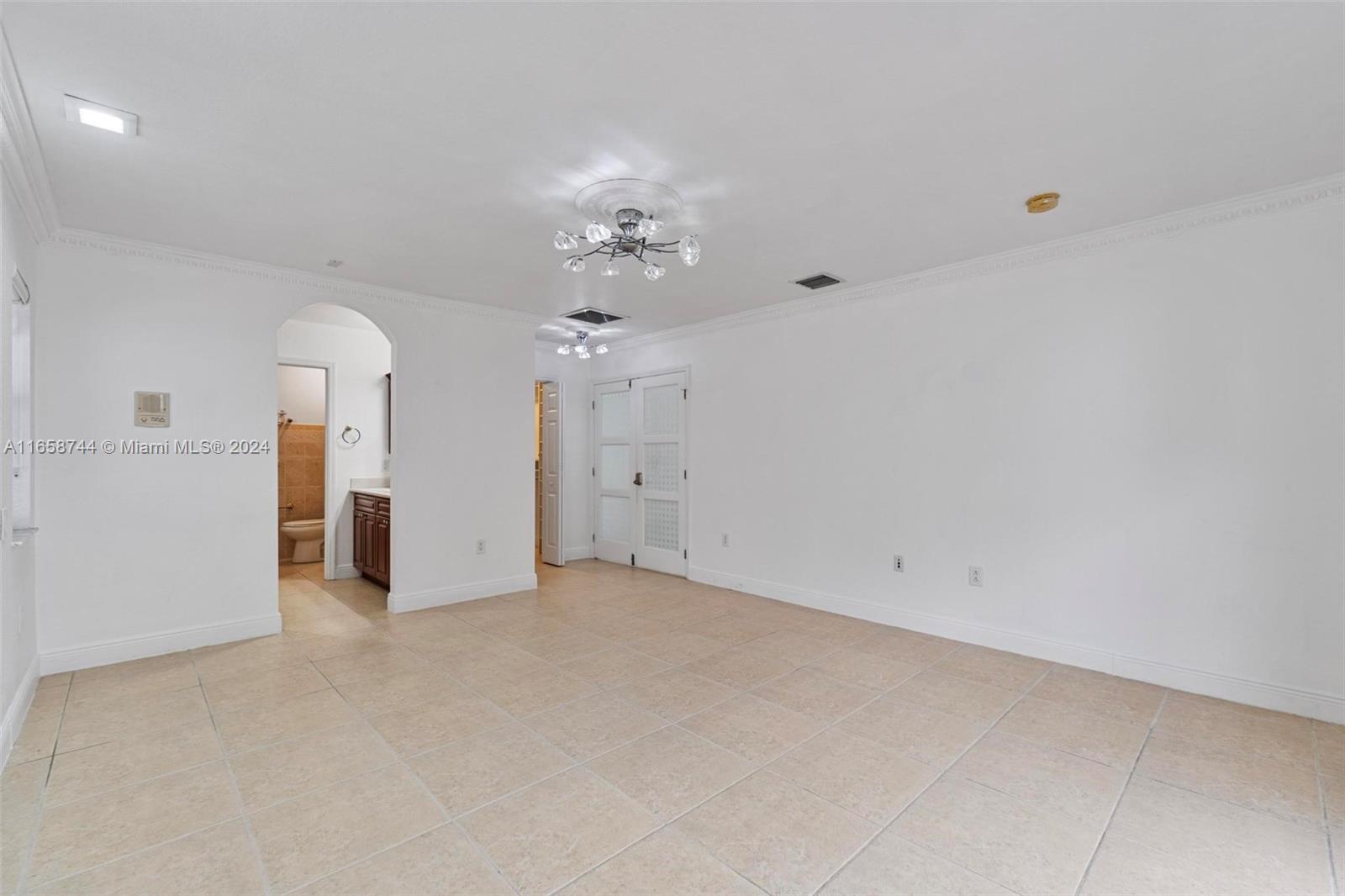 3209 Southwest 142nd Place Miami, FL 33175 - Photo 19 of 42 wooden floor in an empty room
