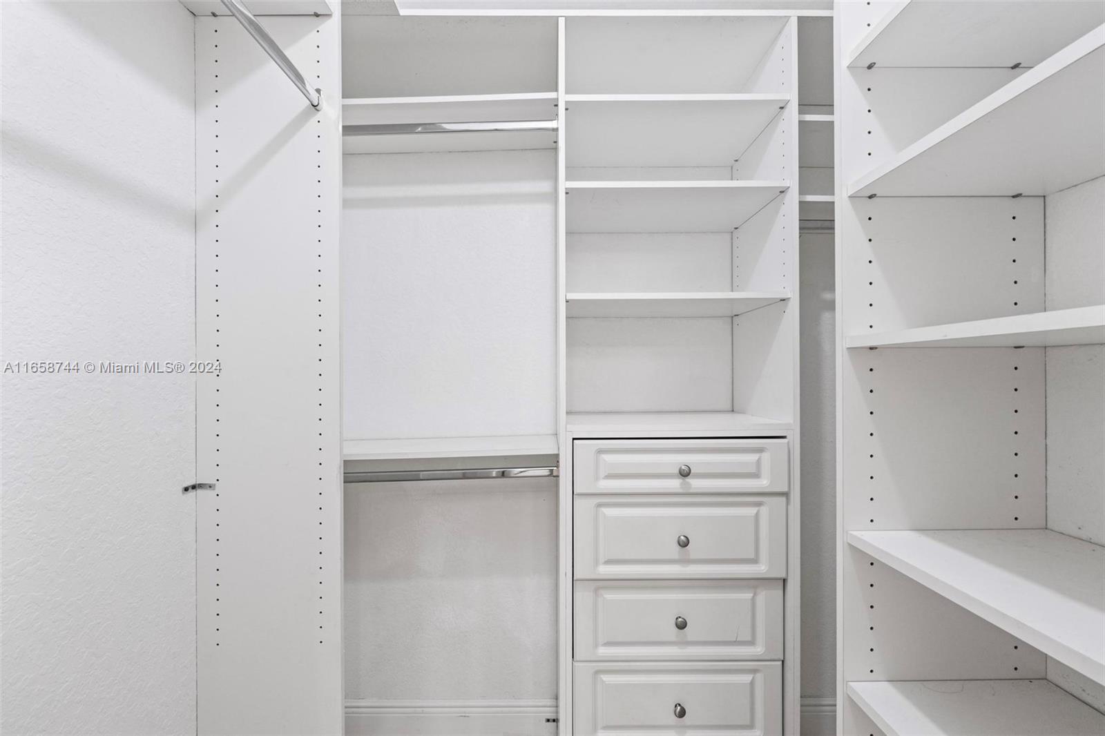 3209 Southwest 142nd Place Miami, FL 33175 - Photo 29 of 42 a view of walk in closet
