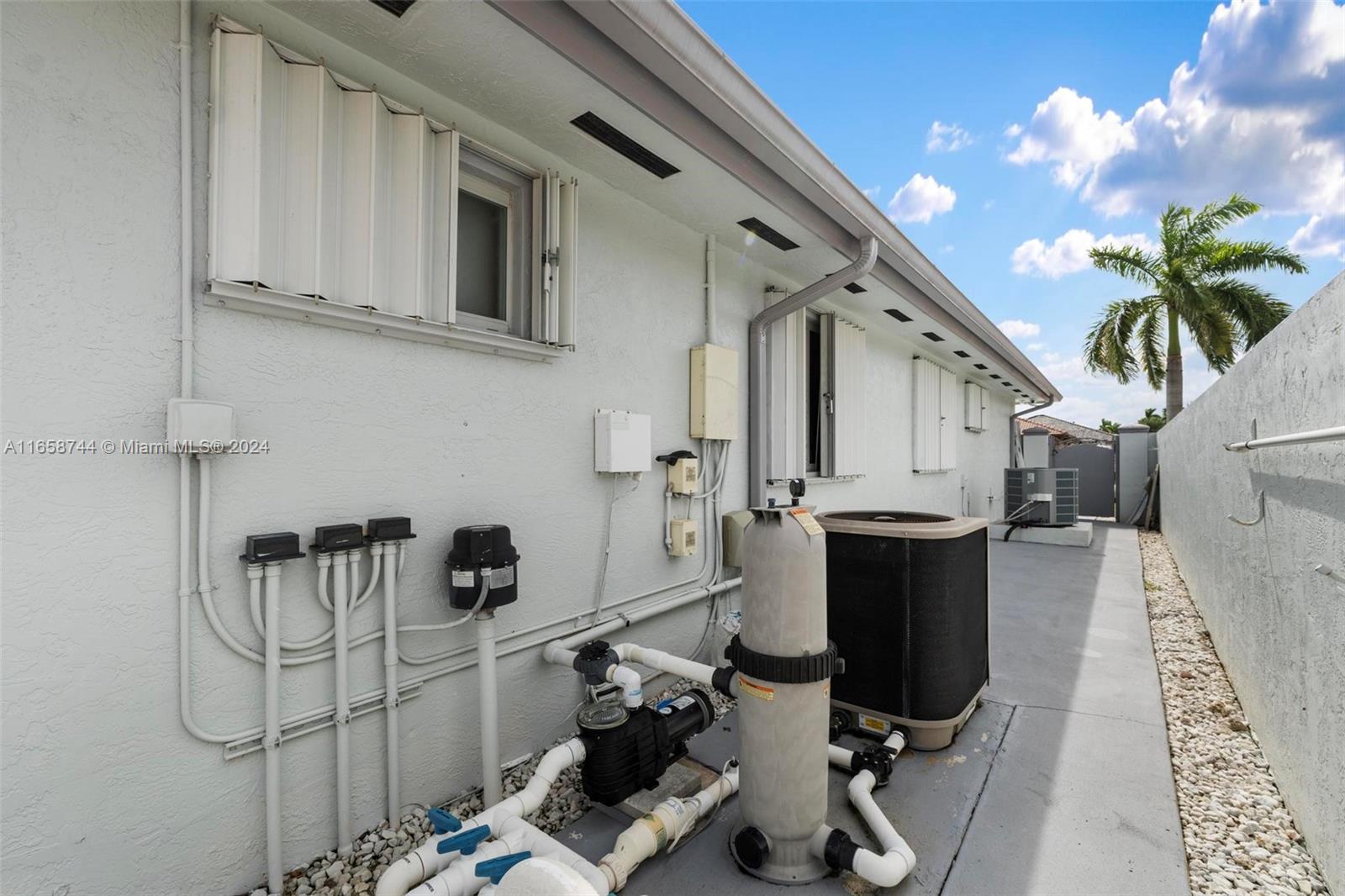 3209 Southwest 142nd Place Miami, FL 33175 - Photo 37 of 42 a view of a storage & utility room with stuff