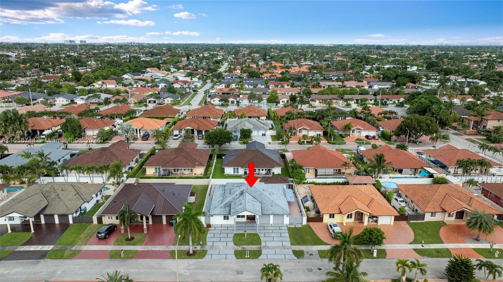 3209 Southwest 142nd Place Miami, FL 33175 - Photo 38 of 42 an aerial view of residential houses with outdoor space