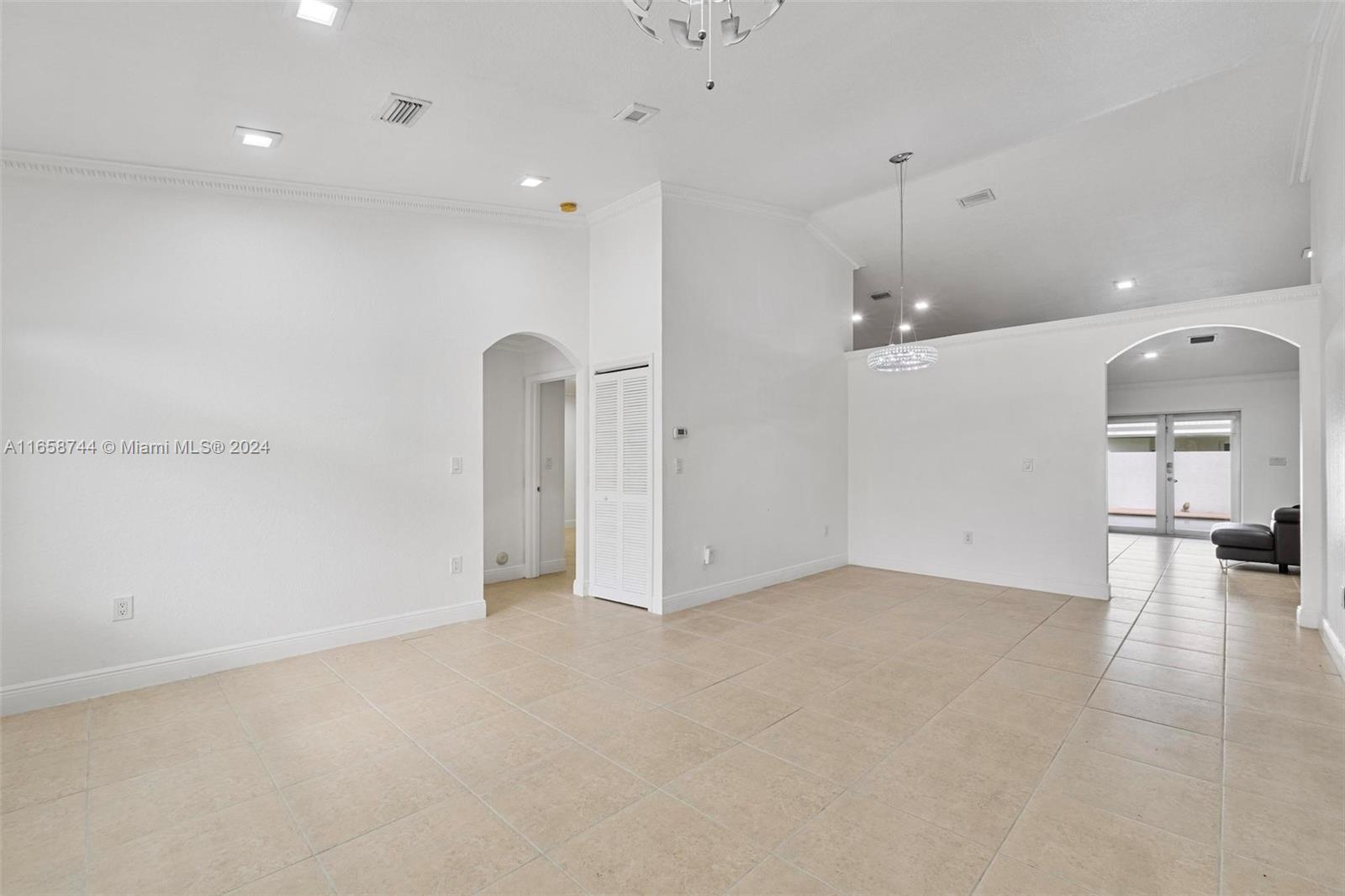 3209 Southwest 142nd Place Miami, FL 33175 - Photo 6 of 42 a view of a kitchen with a sink and a large window