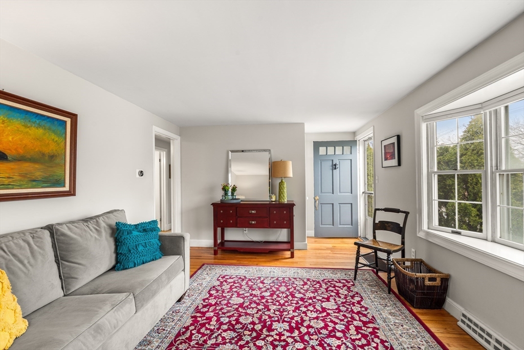 72 Village Street Marblehead, MA 01945 - Photo 2 of 22 a living room with furniture and a window