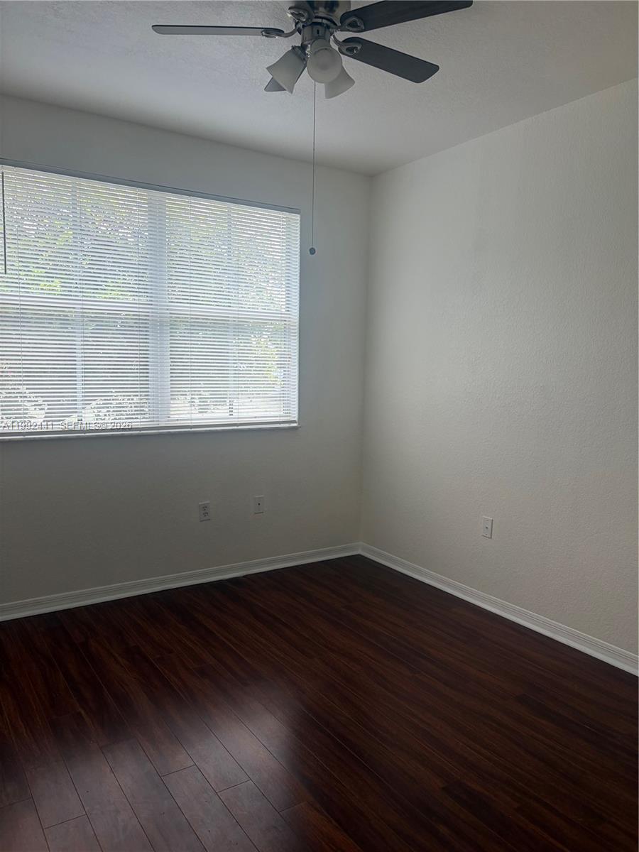 12398 Southwest 125th Terrace Miami, FL 33186 - Photo 28 of 45 an empty room with a window