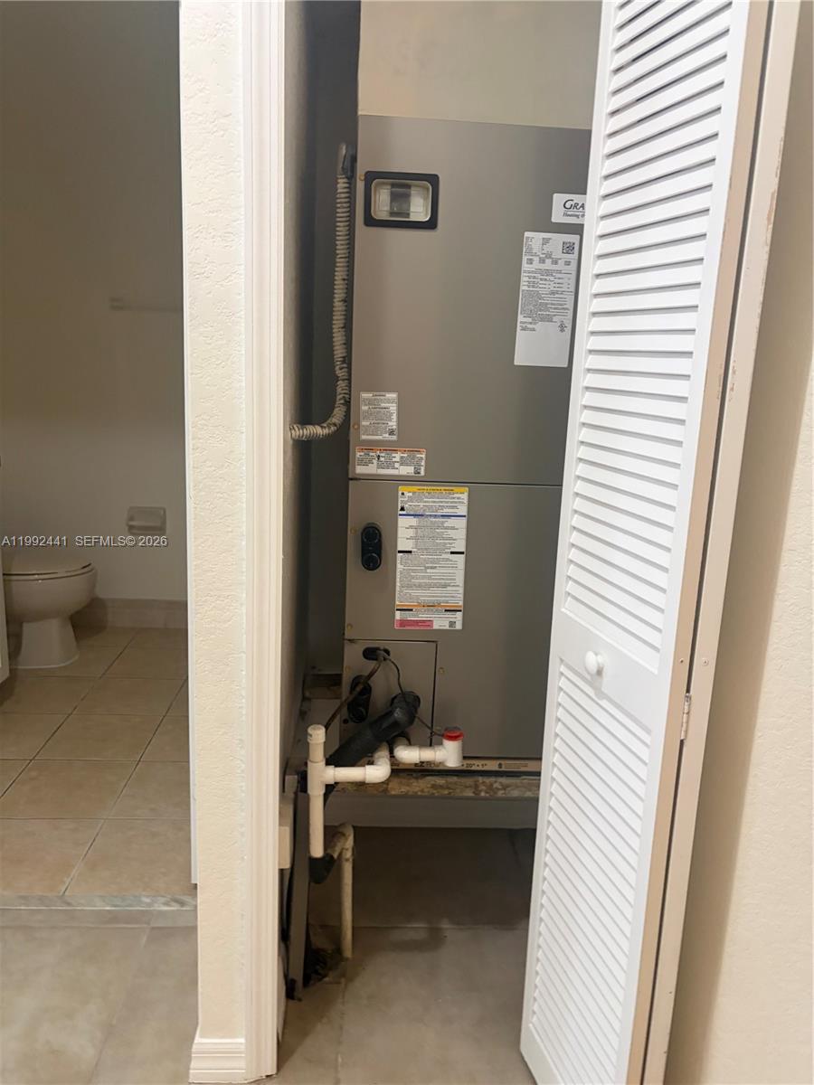 12398 Southwest 125th Terrace Miami, FL 33186 - Photo 33 of 45 a bathroom with a sink and a toilet