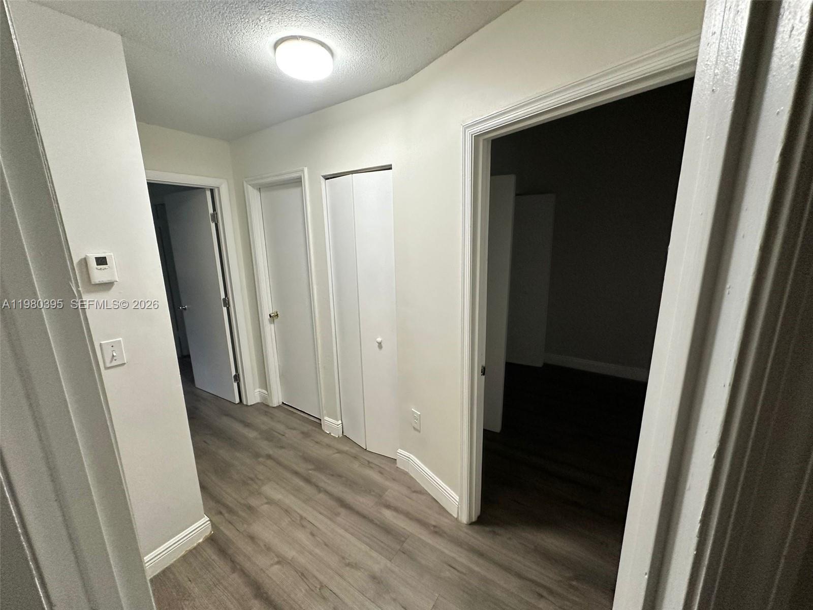 6235 Southwest Kendale Lakes Circle, Unit 237 Miami, FL 33183 - Photo 14 of 24 wooden floor in a gallery