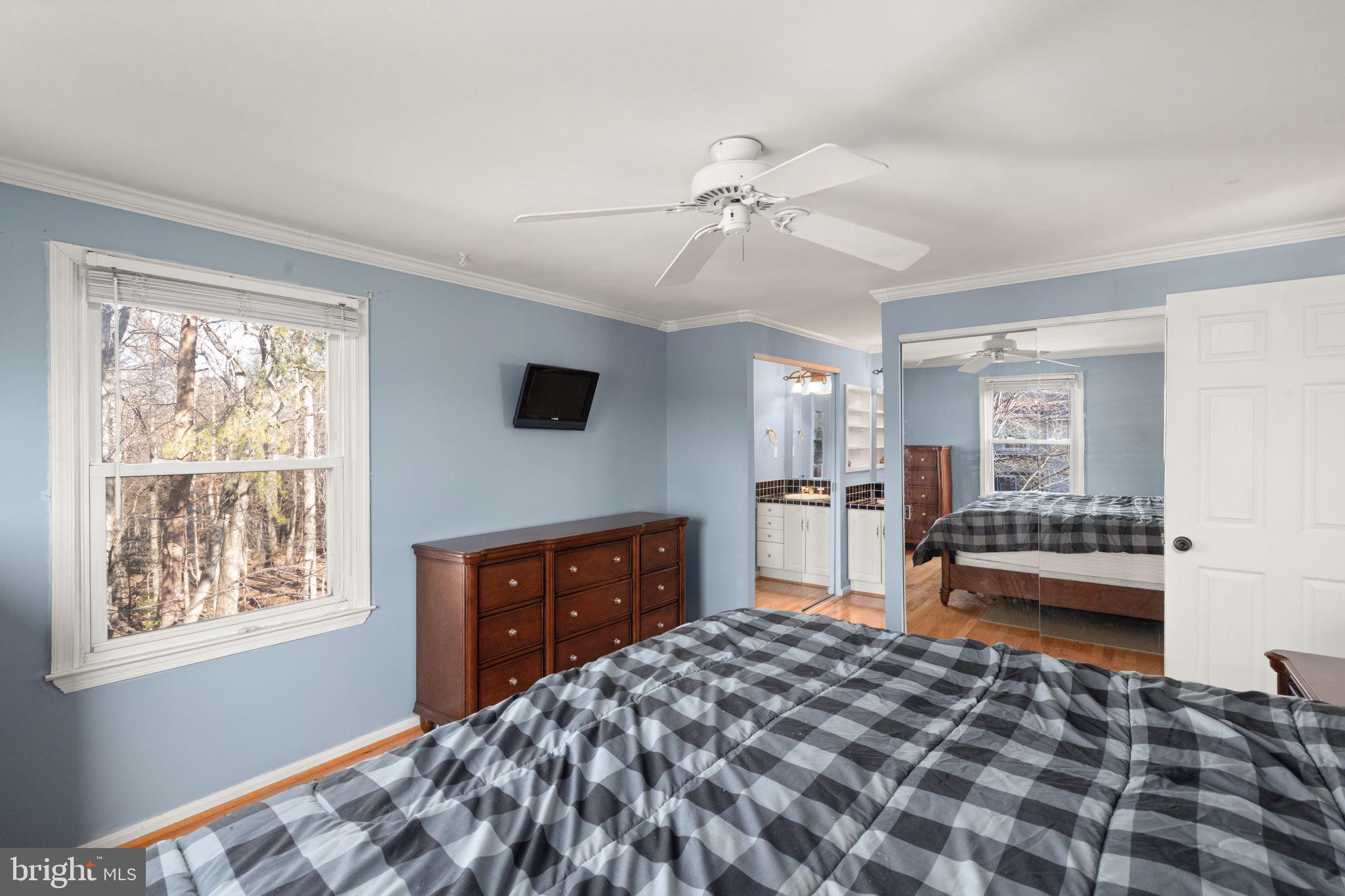 4802 Variation Road Nottingham, MD 21236 - Photo 16 of 32 a bedroom with a bed and wooden floor