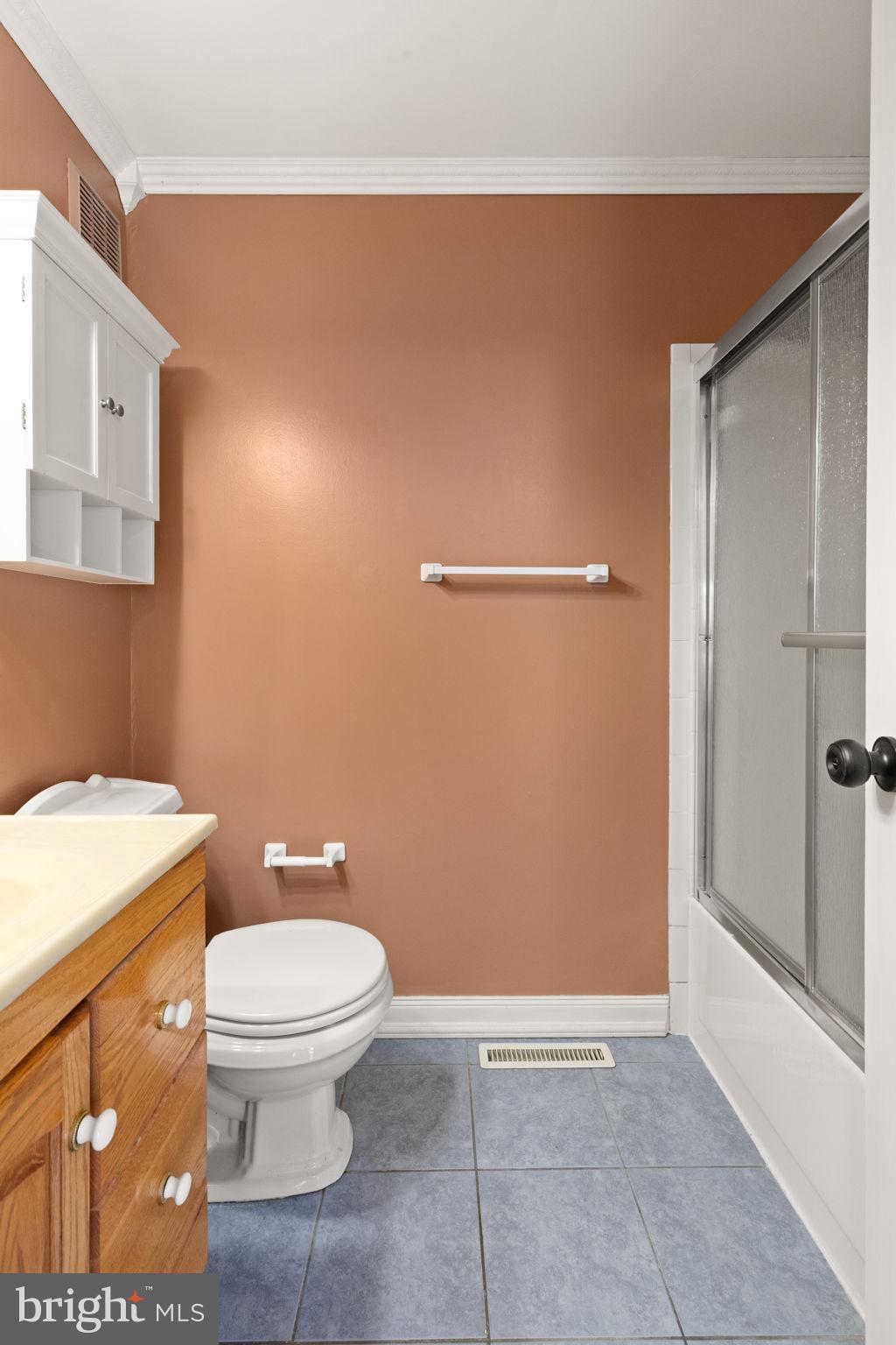 4802 Variation Road Nottingham, MD 21236 - Photo 18 of 32 a bathroom with a toilet and a shower
