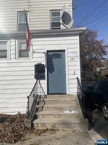 a view of entryway with a front door