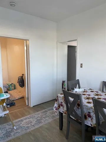 a bed room with a bed and a window