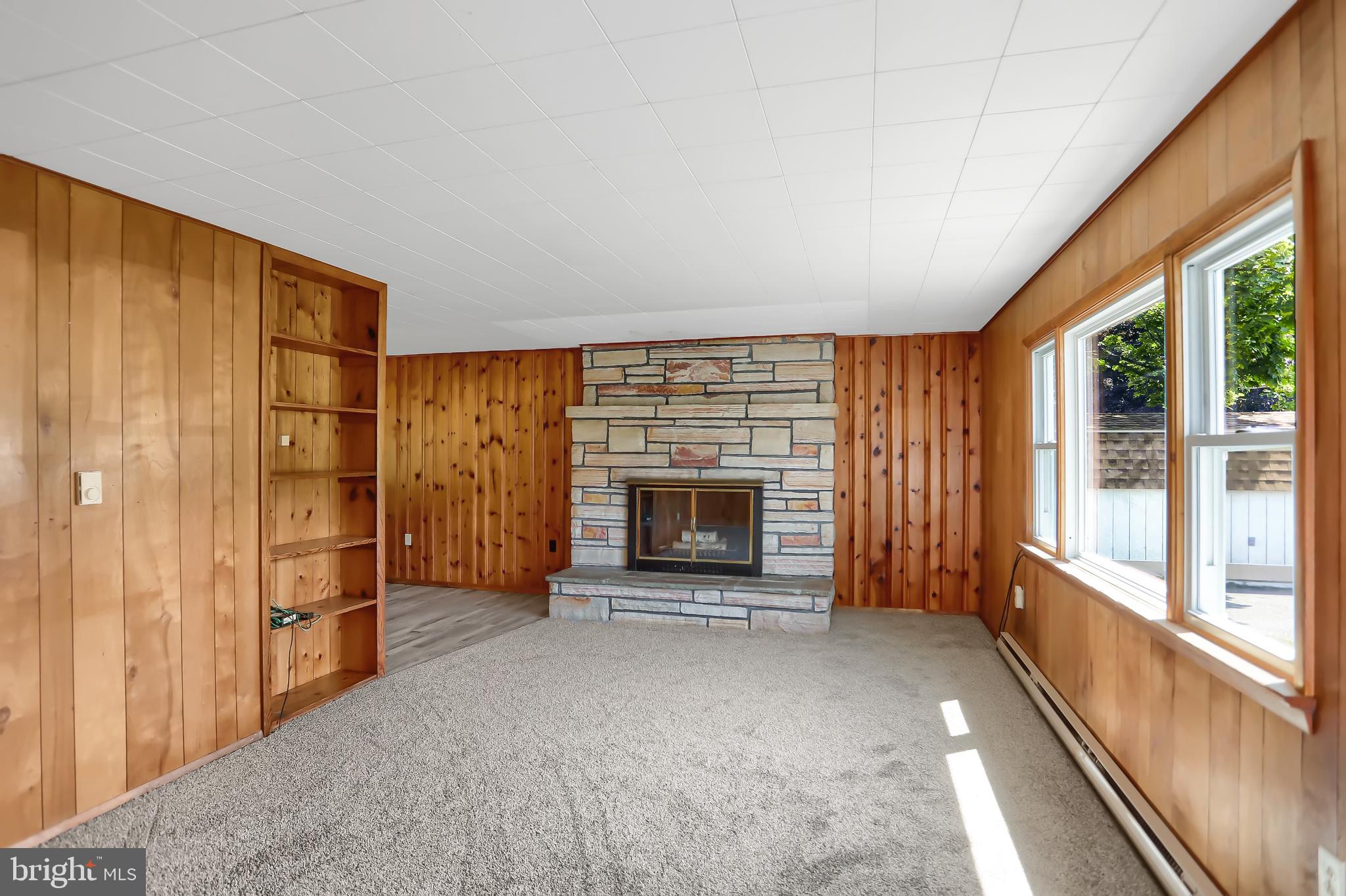 650 Pleasant Valley Road Elliottsburg, PA 17024 - Photo 9 of 22 liv. rm. wood burning fireplace & new carpet