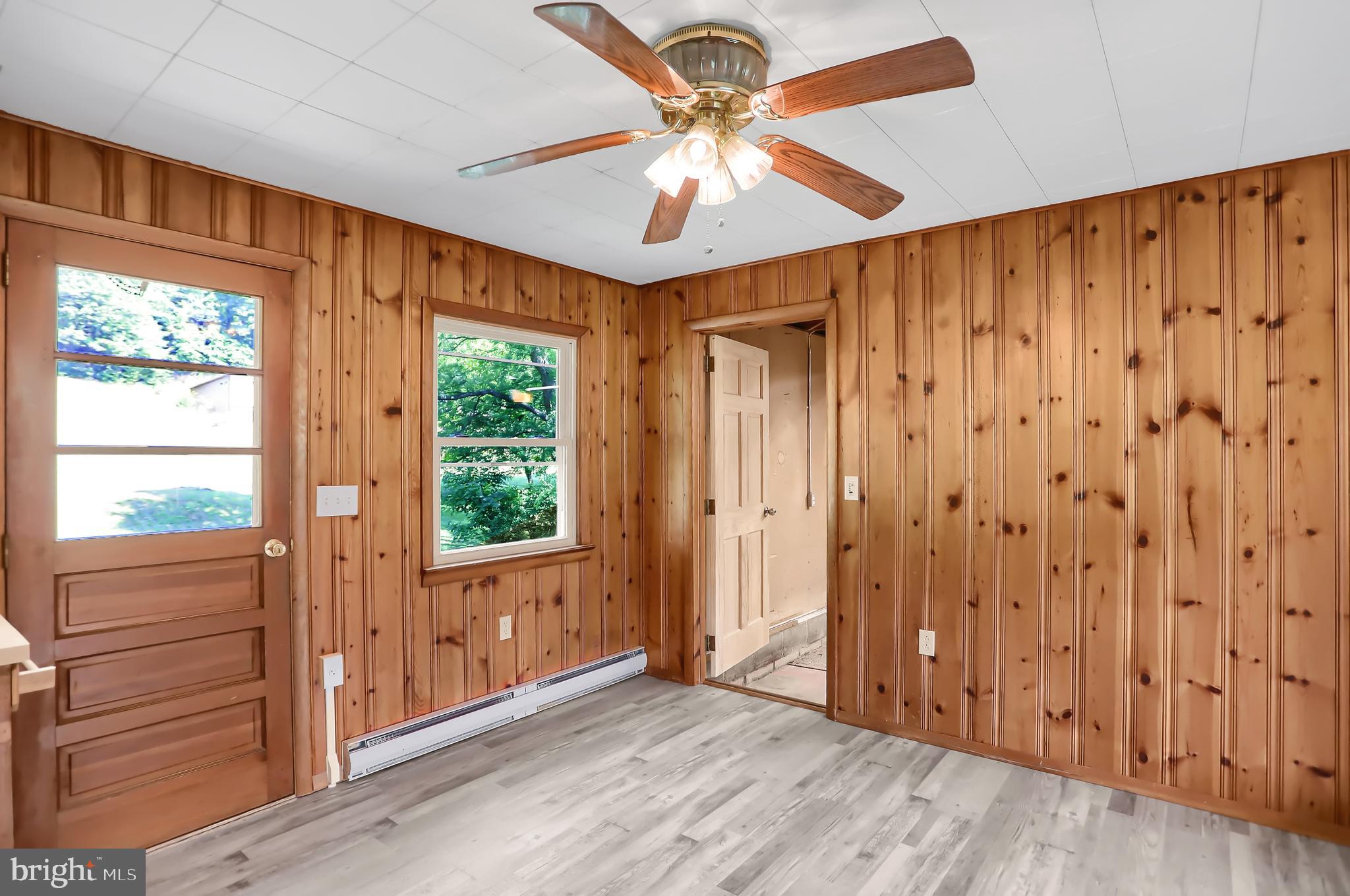 650 Pleasant Valley Road Elliottsburg, PA 17024 - Photo 10 of 22 din.area-entrance to garage & door to small deck
