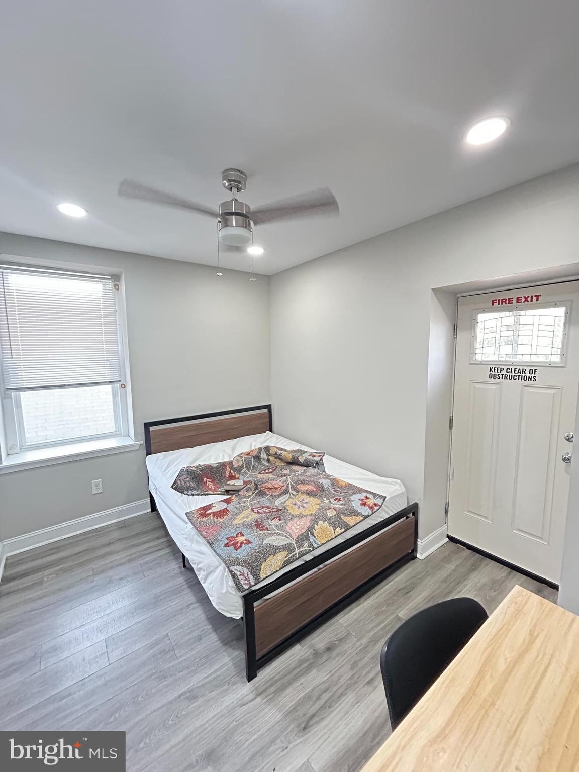 2417 North 54th Street, Unit D Philadelphia, PA 19131 - Photo 11 of 13 a bedroom with bed and window