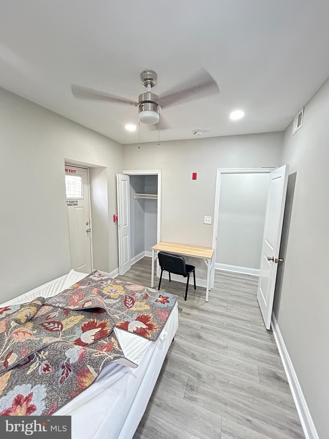 2417 North 54th Street, Unit D Philadelphia, PA 19131 - Photo 12 of 13 a bedroom with a bed and a table