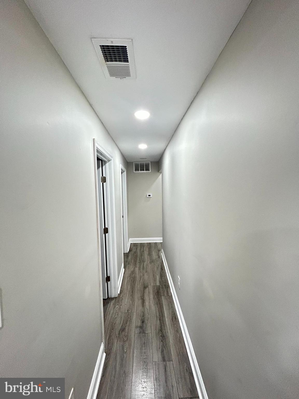 2417 North 54th Street, Unit D Philadelphia, PA 19131 - Photo 6 of 13 a view of hallway with wooden floor