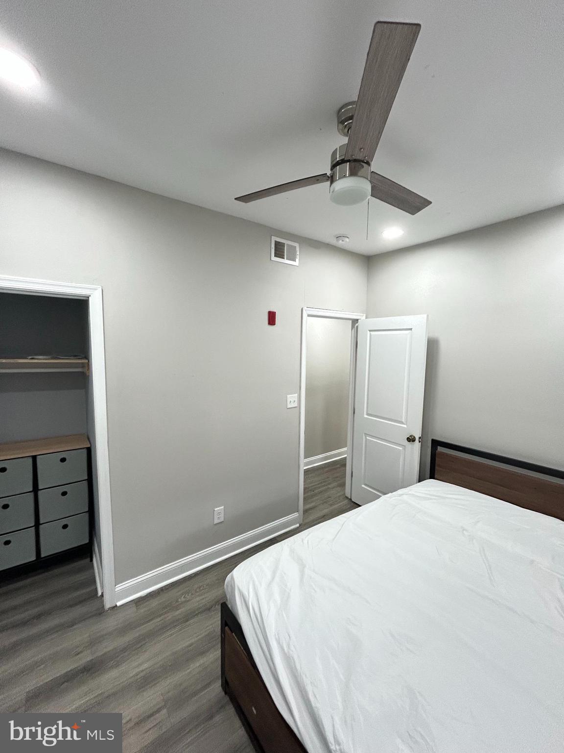 2417 North 54th Street, Unit D Philadelphia, PA 19131 - Photo 10 of 13 a bedroom with a bed and a ceiling fan