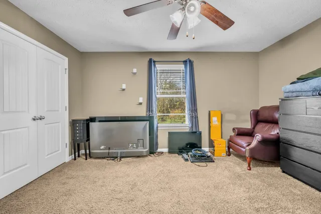 view of living room with furniture and window