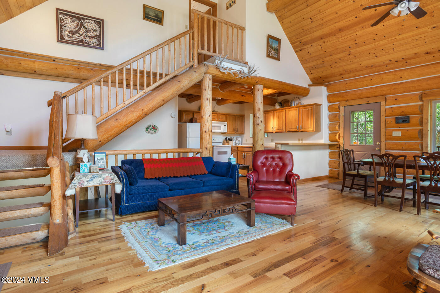 150 County Road Gypsum, CO 81637 - Photo 19 of 43 a living room filled with furniture and a table