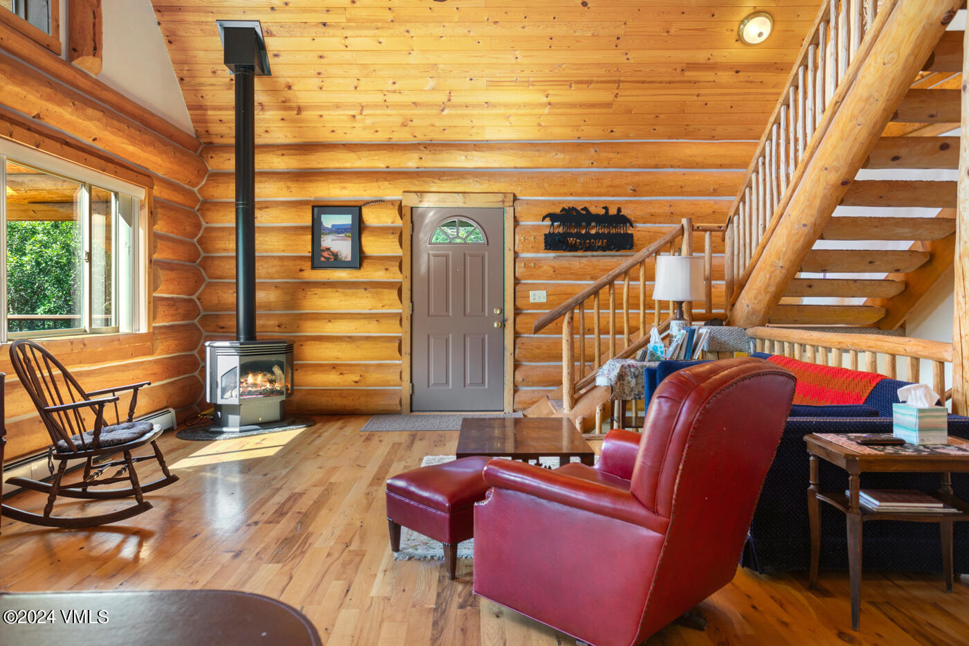 150 County Road Gypsum, CO 81637 - Photo 20 of 43 a living room with furniture a ceiling fan and a window