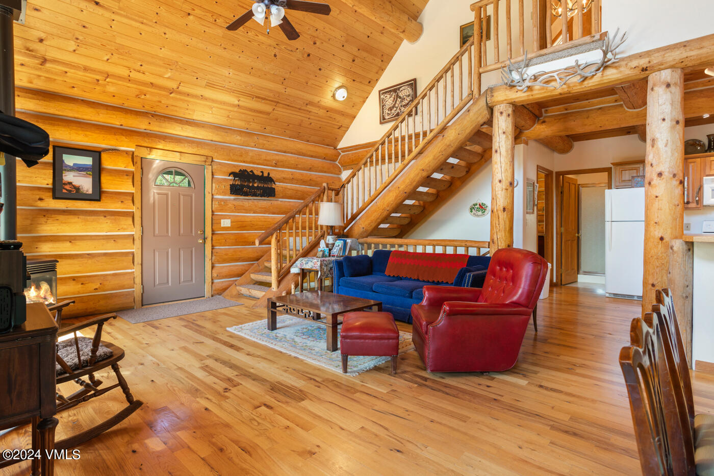 150 County Road Gypsum, CO 81637 - Photo 21 of 43 a room with wooden floor and furniture