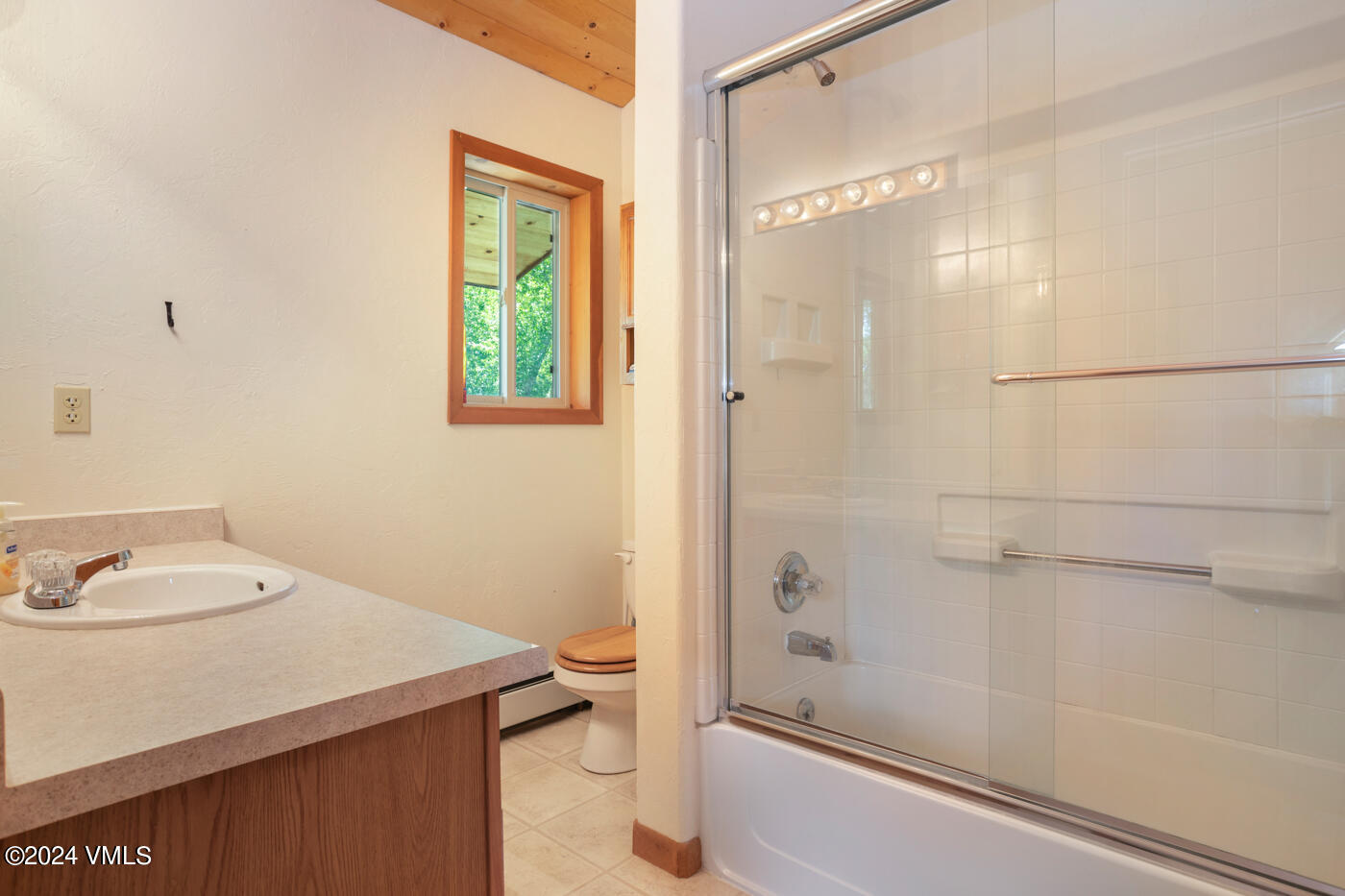 150 County Road Gypsum, CO 81637 - Photo 29 of 43 a bathroom with a sink and a mirror