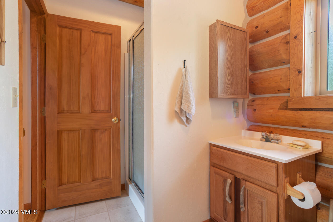 150 County Road Gypsum, CO 81637 - Photo 34 of 43 a bathroom with a sink and mirror