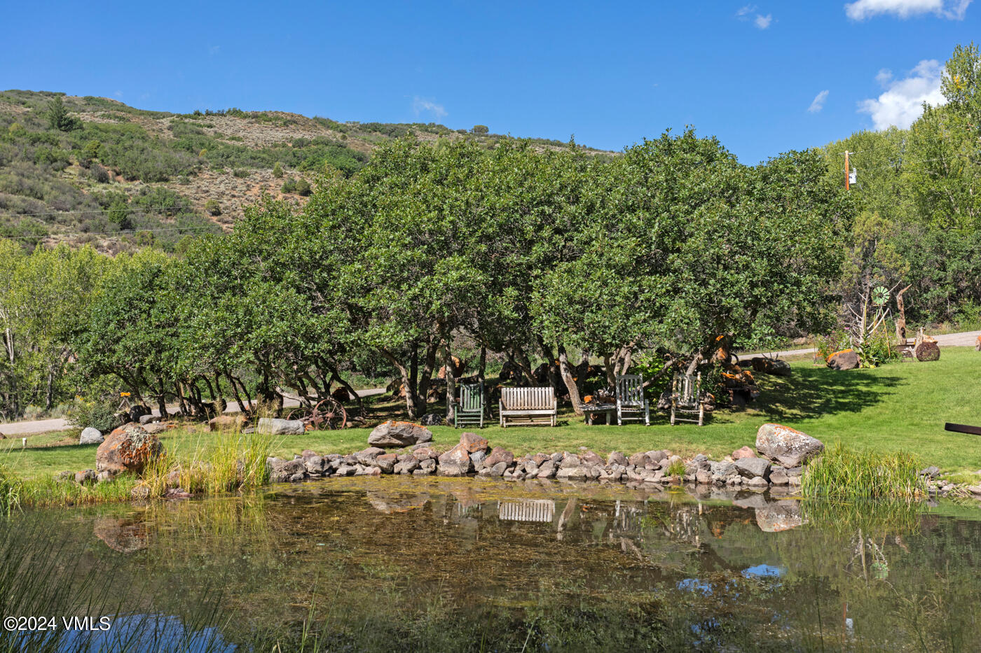 150 County Road Gypsum, CO 81637 - Photo 4 of 43 a view of a lake with houses