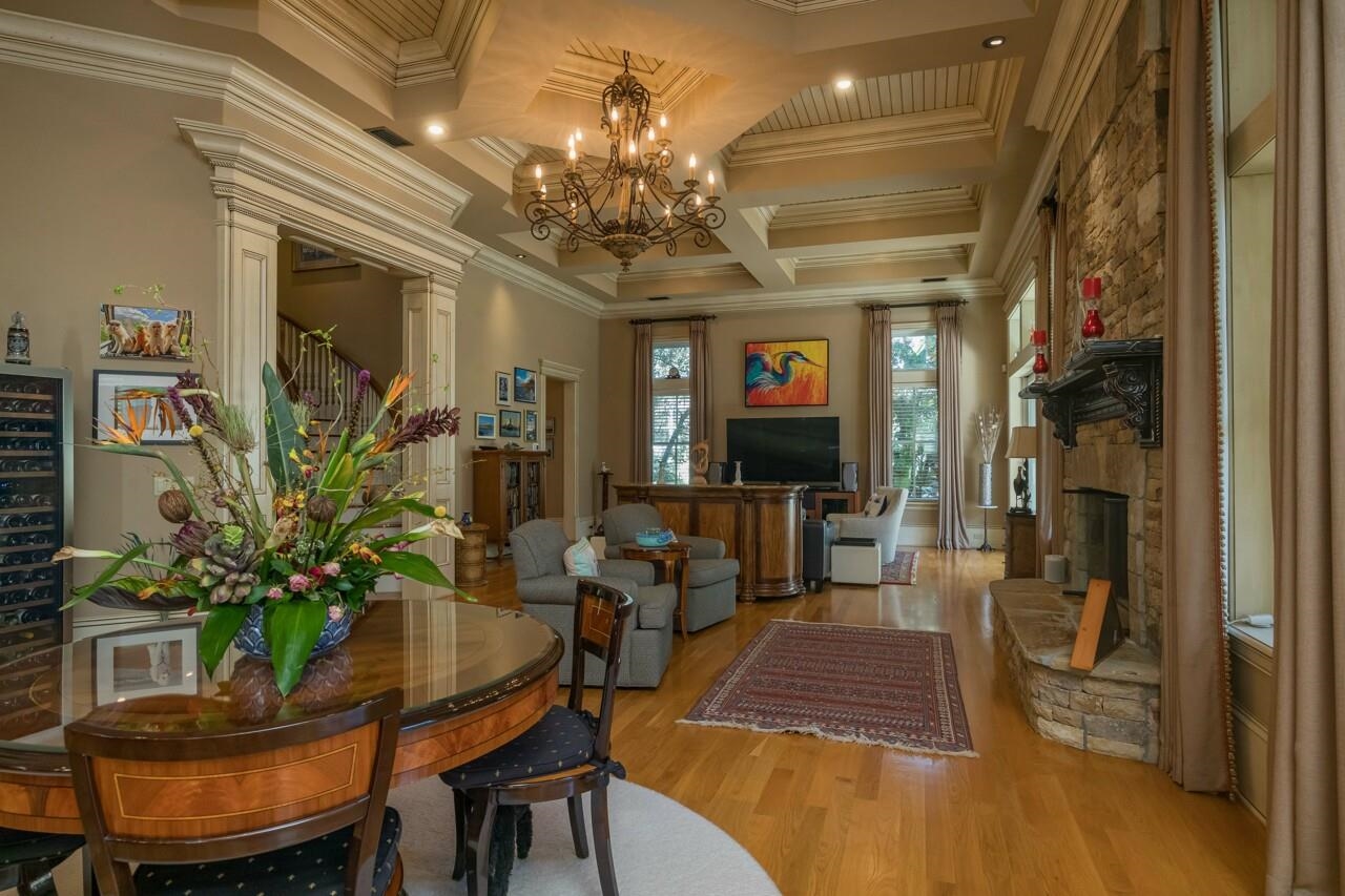 924 Ocean Palm Way St. Augustine, FL 32080 - Photo 19 of 81 a view of a dining room with furniture and a chandelier