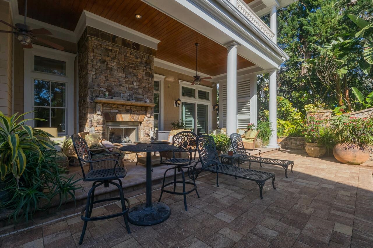 924 Ocean Palm Way St. Augustine, FL 32080 - Photo 26 of 81 a view of a house with backyard and sitting area