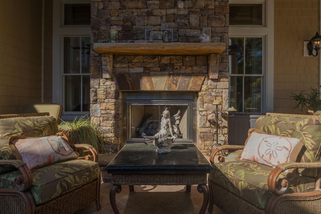 924 Ocean Palm Way St. Augustine, FL 32080 - Photo 27 of 81 a living room with furniture and a fireplace