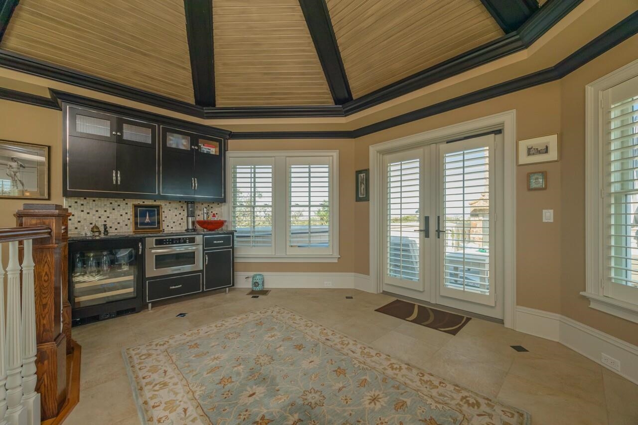 924 Ocean Palm Way St. Augustine, FL 32080 - Photo 52 of 81 a view of an empty room with a window