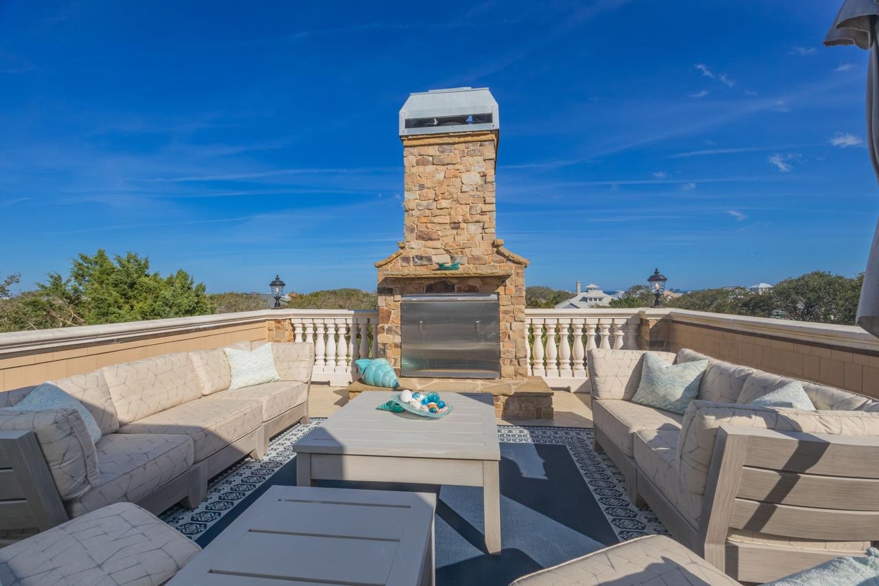 924 Ocean Palm Way St. Augustine, FL 32080 - Photo 55 of 81 a balcony with furniture and wooden floor