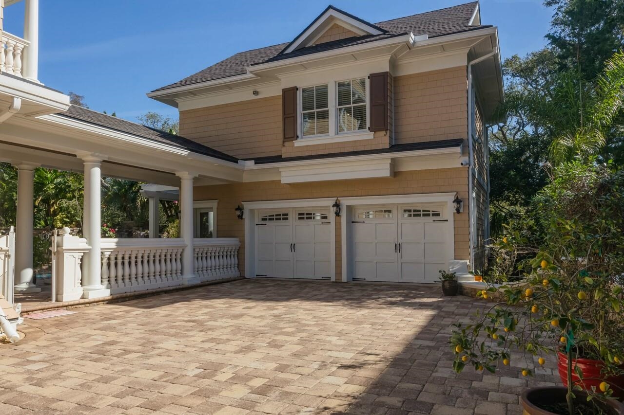 924 Ocean Palm Way St. Augustine, FL 32080 - Photo 57 of 81 a front view of a house with a garden