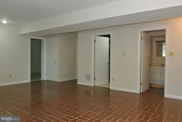 a bathroom with a toilet and a sink